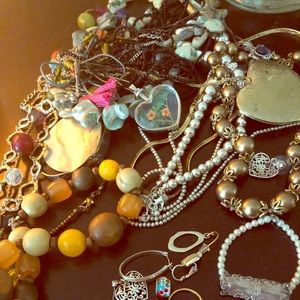 Grandma’s vintage jewelry! A glass vase full!